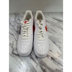 Nike Men’s White Sneakers with Orange Swoosh